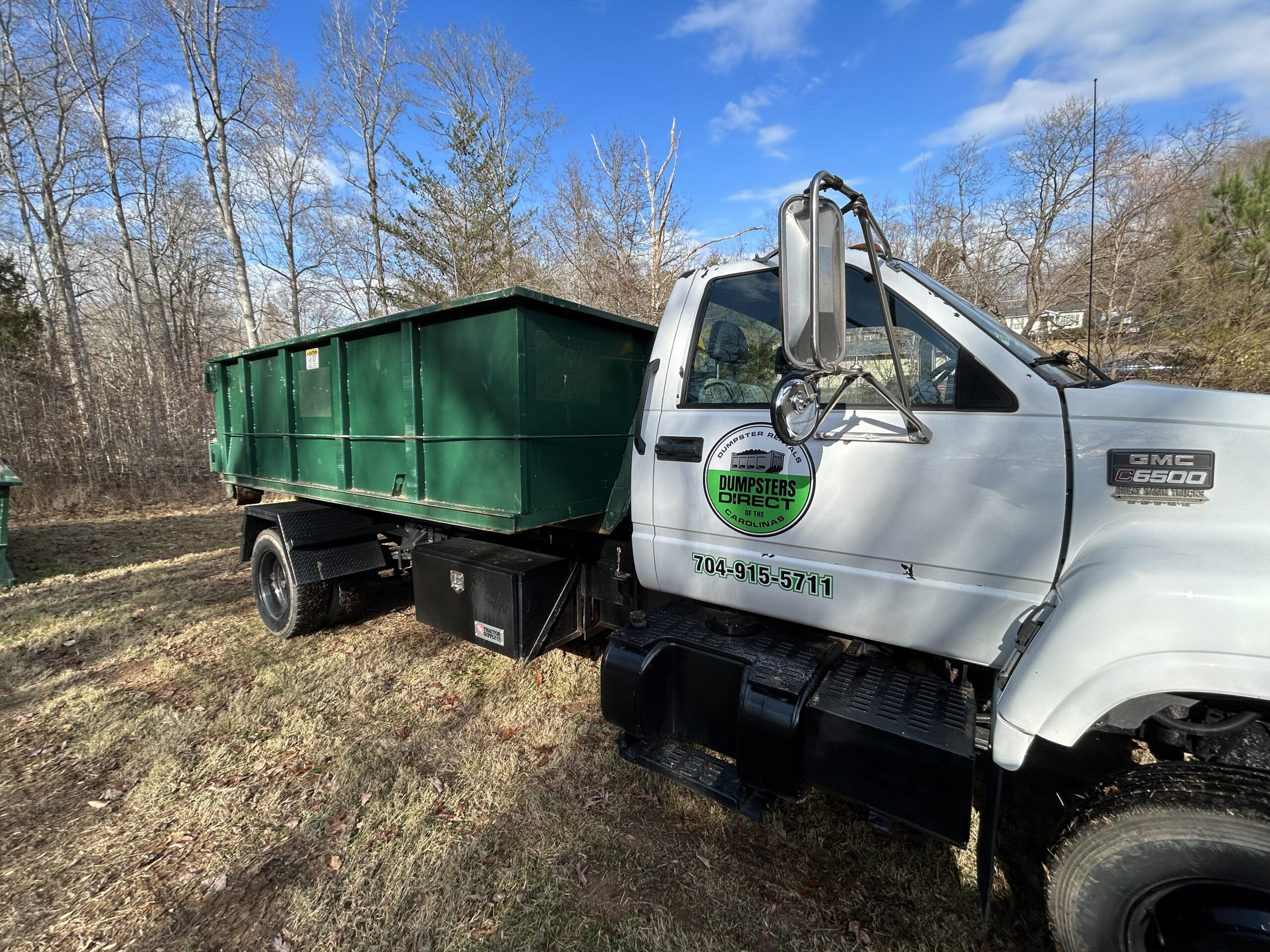 Dumpster delivery truck belmont nc